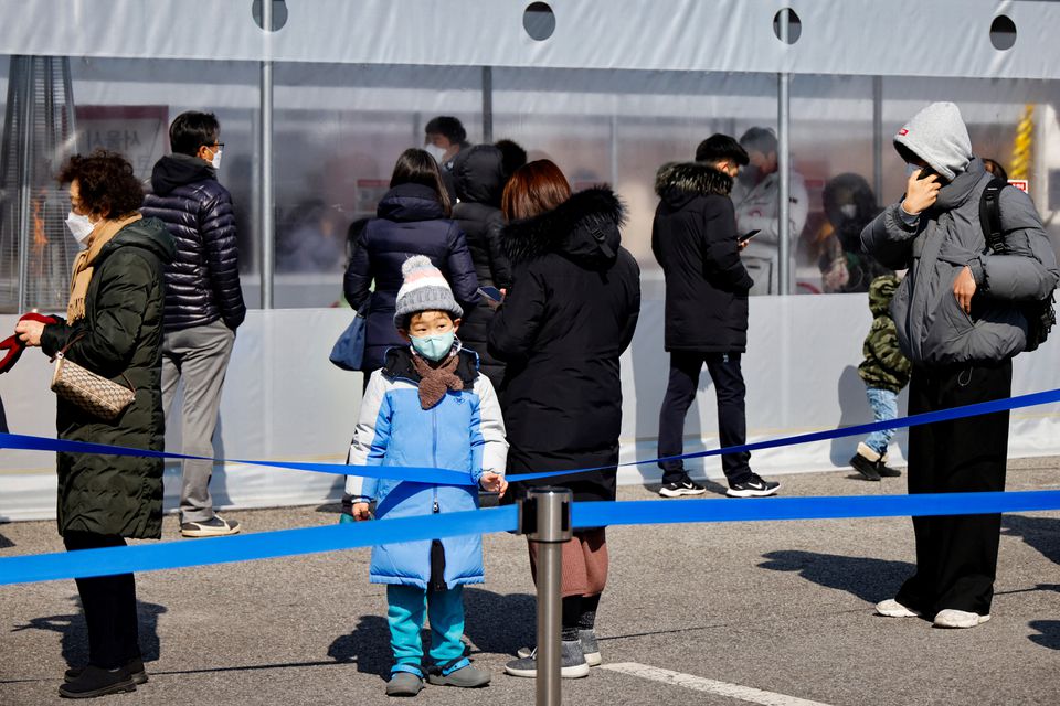 S.Korea prime minister calls for calm as COVID cases hit new record