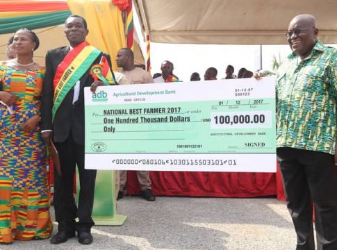 President Akufo-Addo presented a dummy cheque to Mr. Kweku Agyemang during the 2017 National Farmers Day