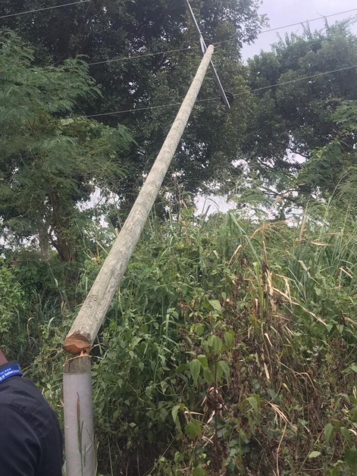 Angry Krobo youths cut down ECG high tension poles to protest continuous outage