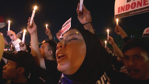 Indonesia football crush: Candlelight vigil for 174 fans who died at stadium