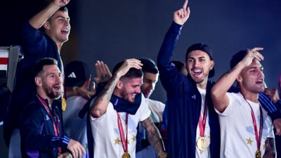 Messi and Argentina land in Buenos Aires with World Cup trophy
