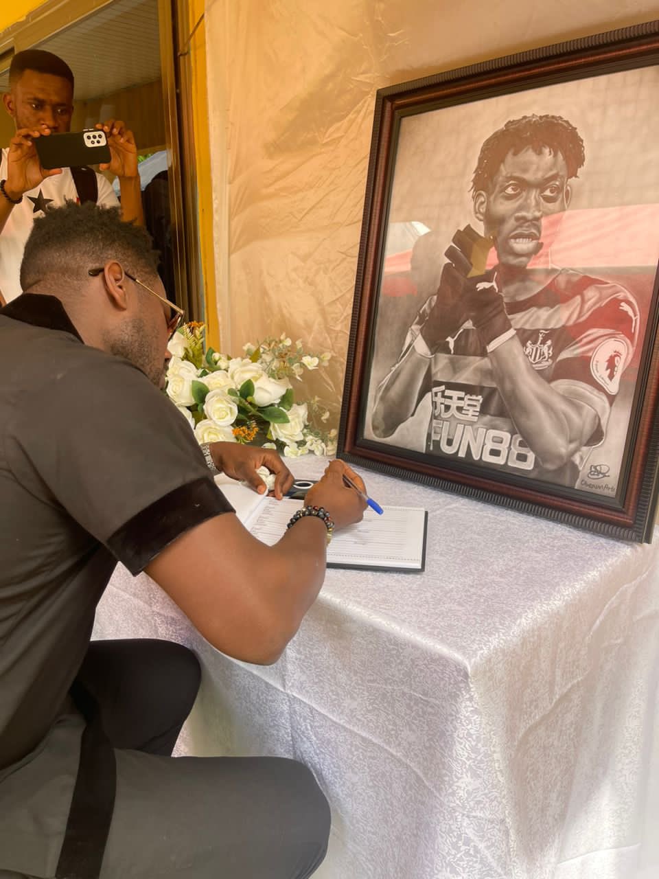 PHOTOS: Asamoah Gyan signs book of condolence in memory of Atsu