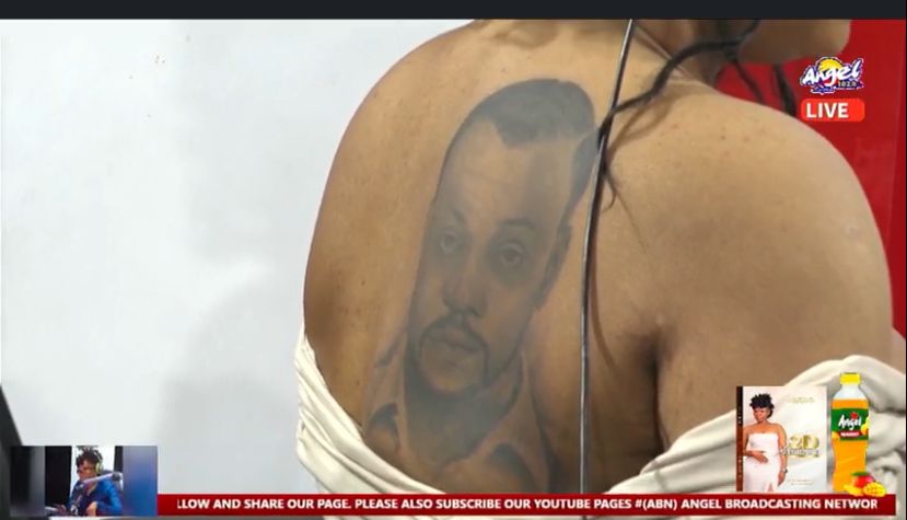 Joyce Dzidzor Mensah tattoos face of Ivorian musician Meiway on her back as a sign of gratitude