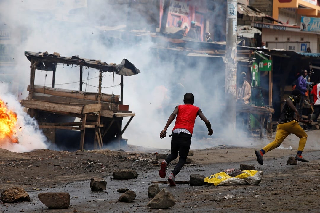 Wenchi Police Commander beaten to pulp by rampaging youth