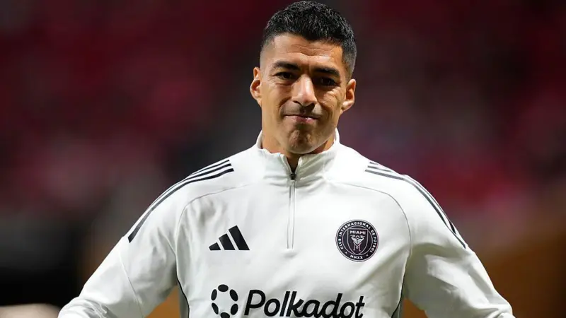 Suarez given six-match ban for spitting incident