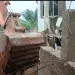 Ga Central authorities pull down wall causing flooding in Palas Town