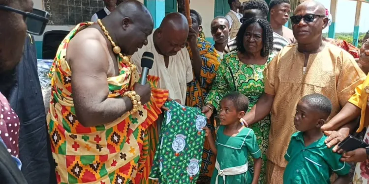 Akurabadze Chief donates 1,200 books, uniforms to Catholic Basic School, announces scholarship for top BECE students