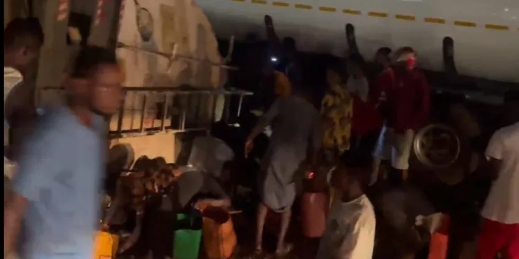 Mad rush for fuel as tanker falls over on Tema-Dawhenya road